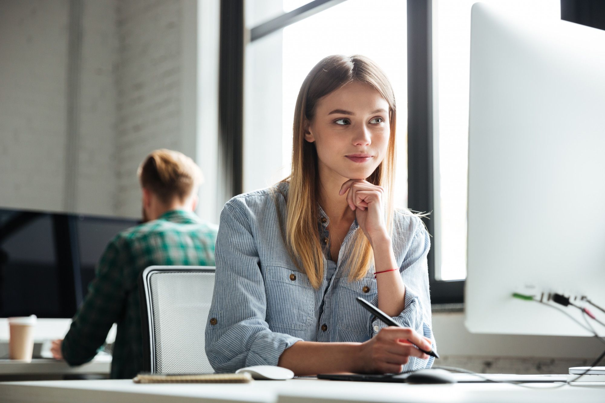 young-woman-work-office-using-computer-graphic-tablet